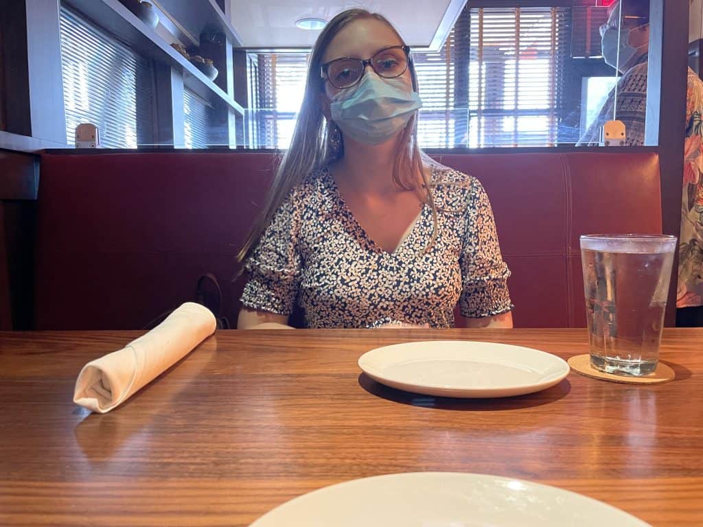 Morgan with a Mask on at Dinner