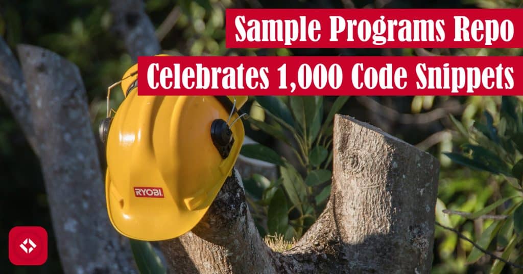 A photo of a hard hat on a tree symbolizing the hard work that went into the 1,000 code snippets with the title of the article overlayed