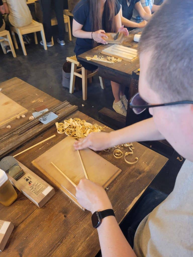 Action shot of me sanding my chopsticks.